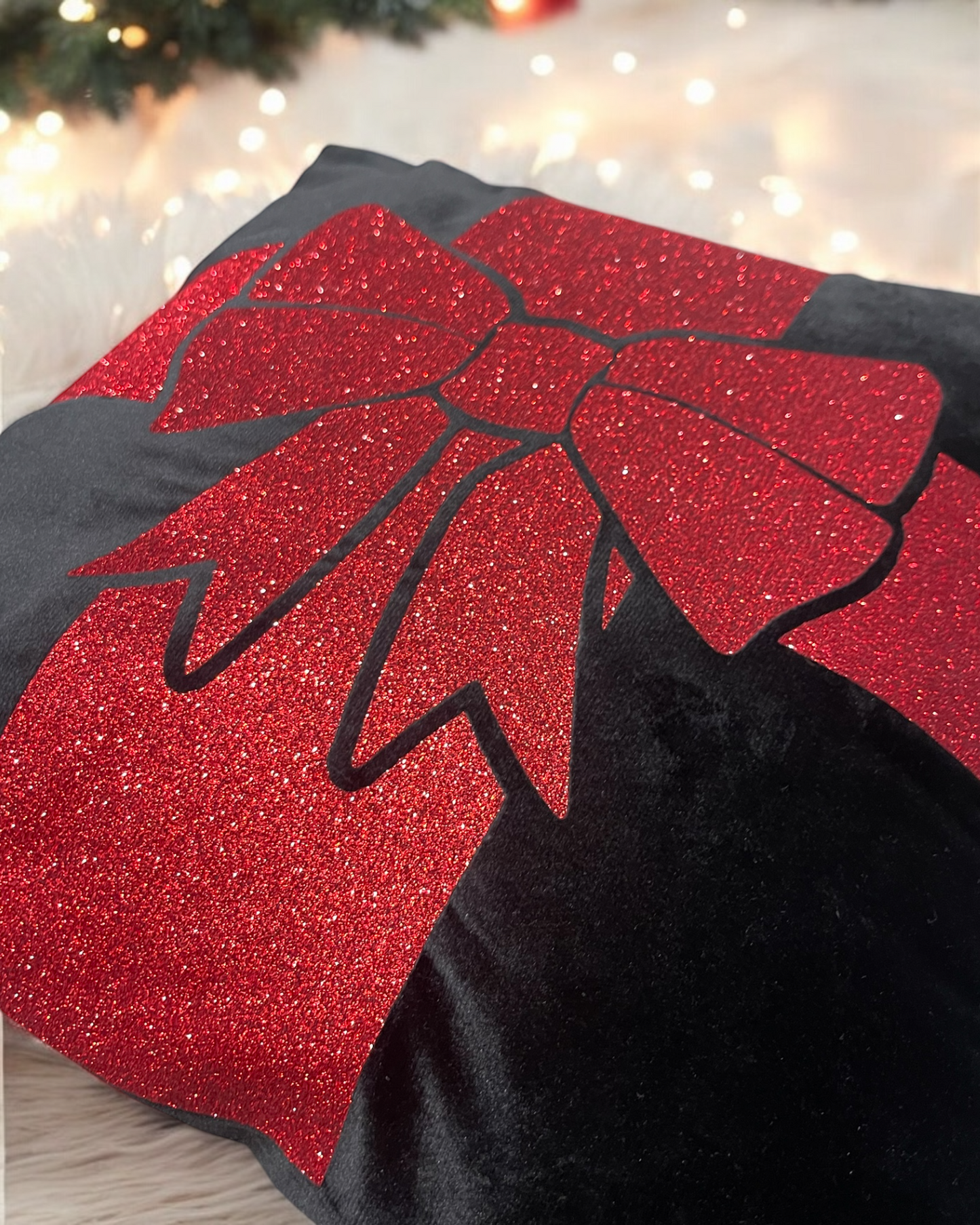 Coussin noir velours, noeud scintillant - 45x45 cm